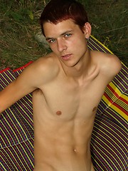 Redhead twink from Czech posing outdoors