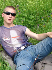 Naughty outdoor enthusiast Hubert playing with his cock on a green meadow