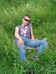 Naughty outdoor enthusiast Hubert playing with his cock on a green meadow
