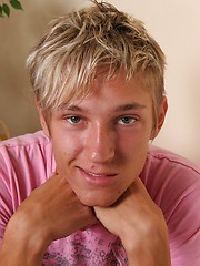 Cute blond twink strokes cock