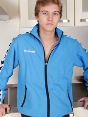 Athletic Logan Lech masturbating in the kitchen.