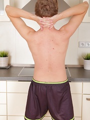Athletic Logan Lech masturbating in the kitchen.