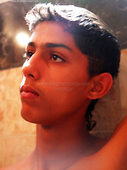 Bronzed latin boy Jose in bath